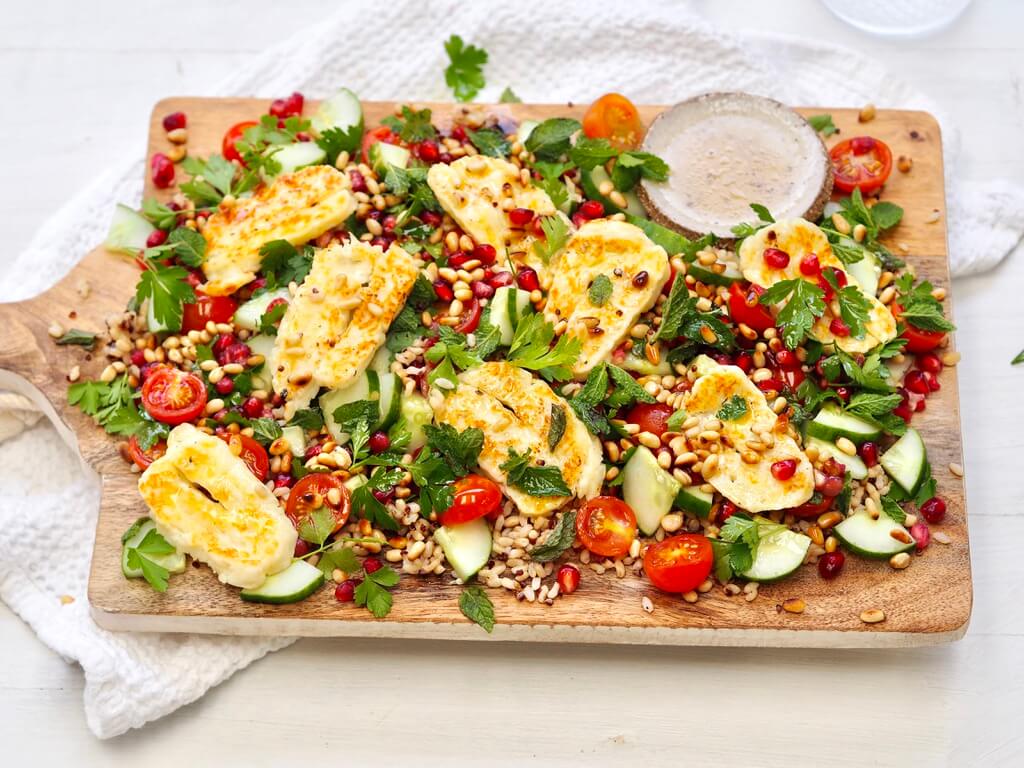 You'll find plenty of cook-up inspo FREE on my website or in my app Back to Basics - for example this delicious Halloumi, Brown Rice + Quinoa Salad! Image: Lyndi Cohen