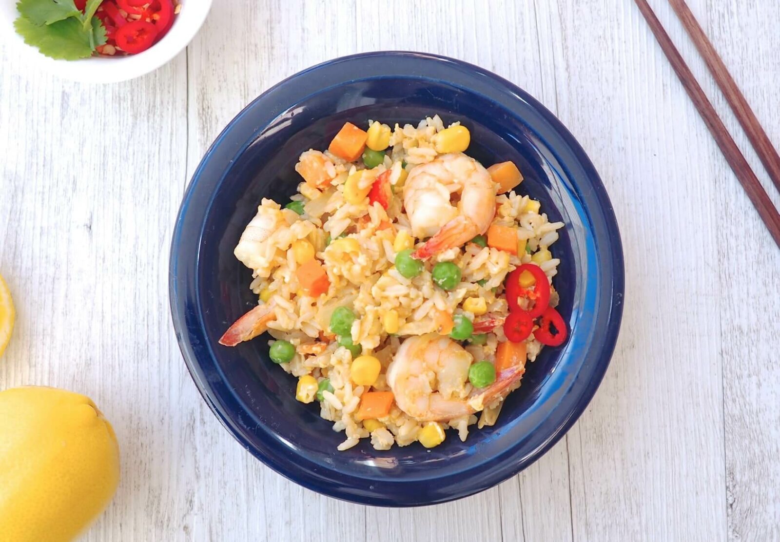 How to get energy while pregnant? Healthier fried rice - like this recipe from Back to Basics Pregnancy App - is an easy way to sneak in some veggies while keeping it plain and carb-based. Image: Lyndi Cohen